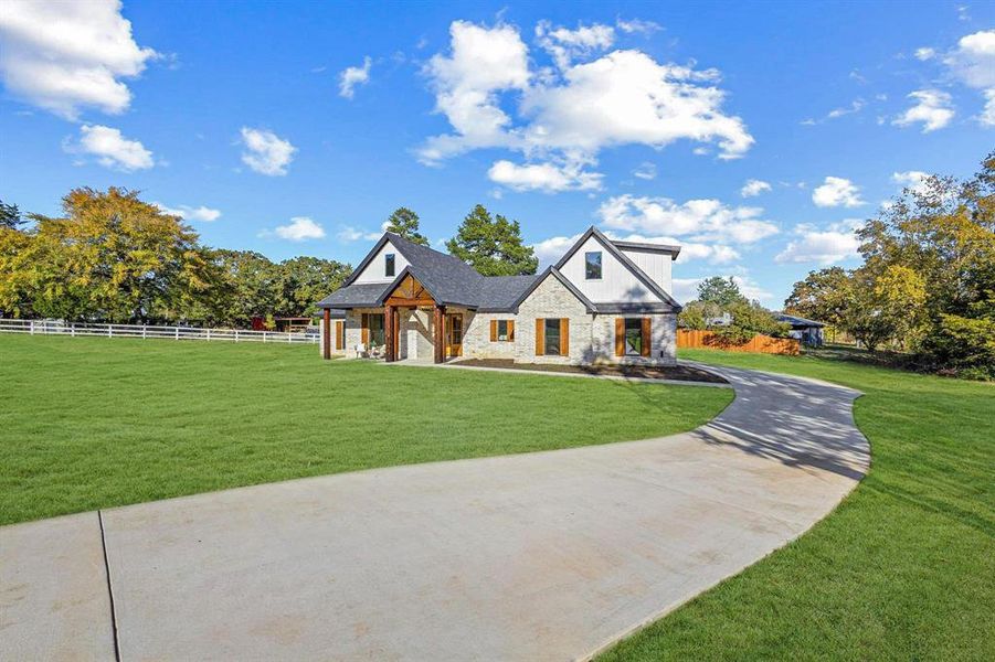 Front exterior of a new home in , Denison, TX, highlighting curb appeal (Image 1). Front exterior of a new home in , Denison, TX, highlighting curb appeal (Image 1).