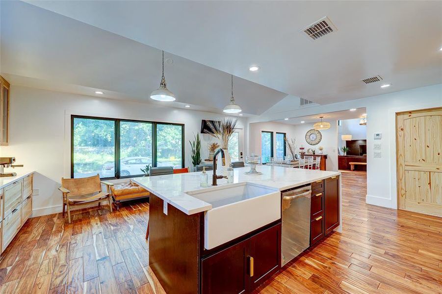Farmhouse sink & Hansgrohe faucet in the center island that is the focal point of this dream kitchen.94 San Saba St., AustinTX 78702 MLS# 7207900