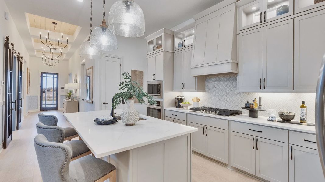 Model home photos of similar floorplans, not pictures of actual home.