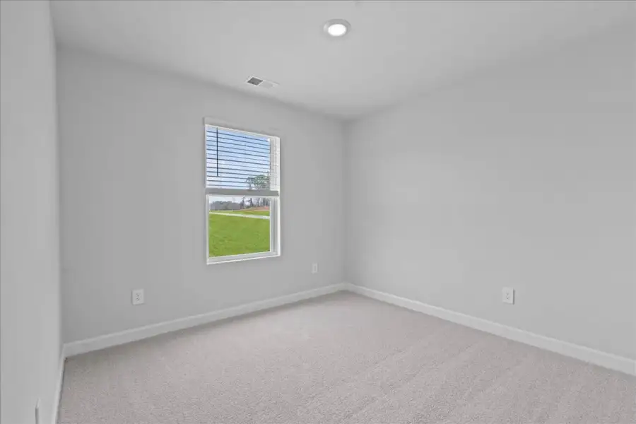 Spacious, unfurnished interior of a new home in Brayfield Manor - Heritage Collection, Wellford (Image 15).