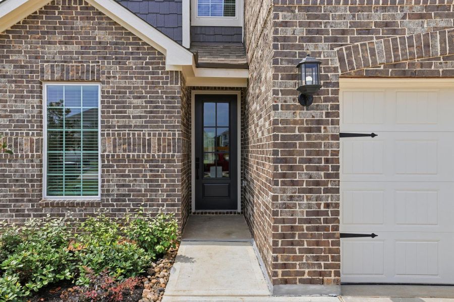 Exterior details and patio area of a home in Magnolia Woods, Magnolia (Image 3). Exterior details and patio area of a home in Magnolia Woods, Magnolia (Image 3).