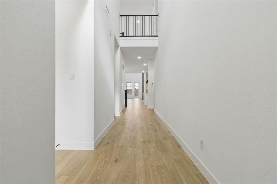 With sight lines from the main entry to the back of the home and ample space to display art work, our Rousseau floor plan offers a welcoming entry for family and friends.