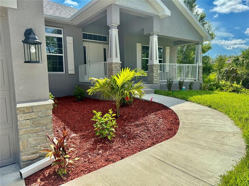 Front exterior of a new home in Port Charlotte, Port Charlotte, FL, highlighting curb appeal (Image 16).