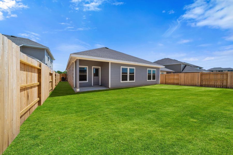 Front exterior of a new home in River Ranch Trails, Dayton, TX, highlighting curb appeal (Image 20). Front exterior of a new home in River Ranch Trails, Dayton, TX, highlighting curb appeal (Image 20).