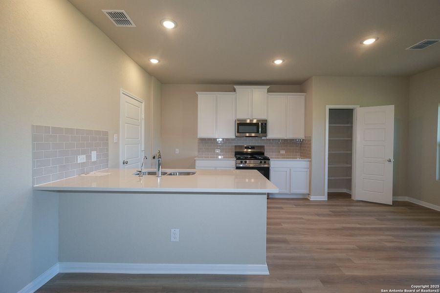Furnished interior view inside a new home in Winding Brook, San Antonio (Image 6).