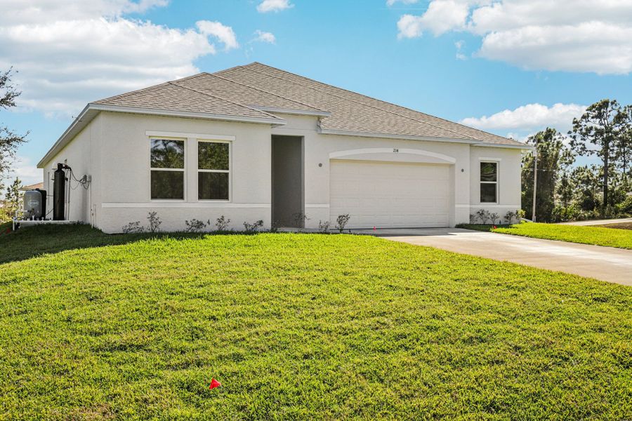 Front exterior of a new home in Marion Oaks, Ocala, FL, highlighting curb appeal (Image 19).