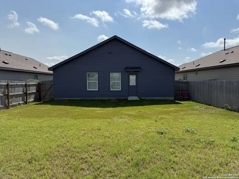 Front exterior of a new home in Navarro Ranch: Watermill Collection, Seguin, TX, highlighting curb appeal (Image 1). Front exterior of a new home in Navarro Ranch: Watermill Collection, Seguin, TX, highlighting curb appeal (Image 1).