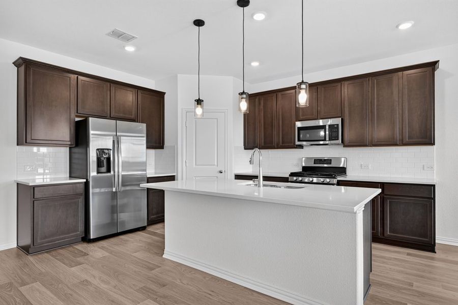 Furnished interior view inside a new home in Parks at Foster Crossing, Anna (Image 5).