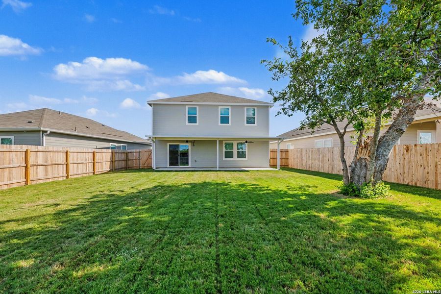 Exterior details and patio area of a home in Hennersby Hollow, San Antonio (Image 21).