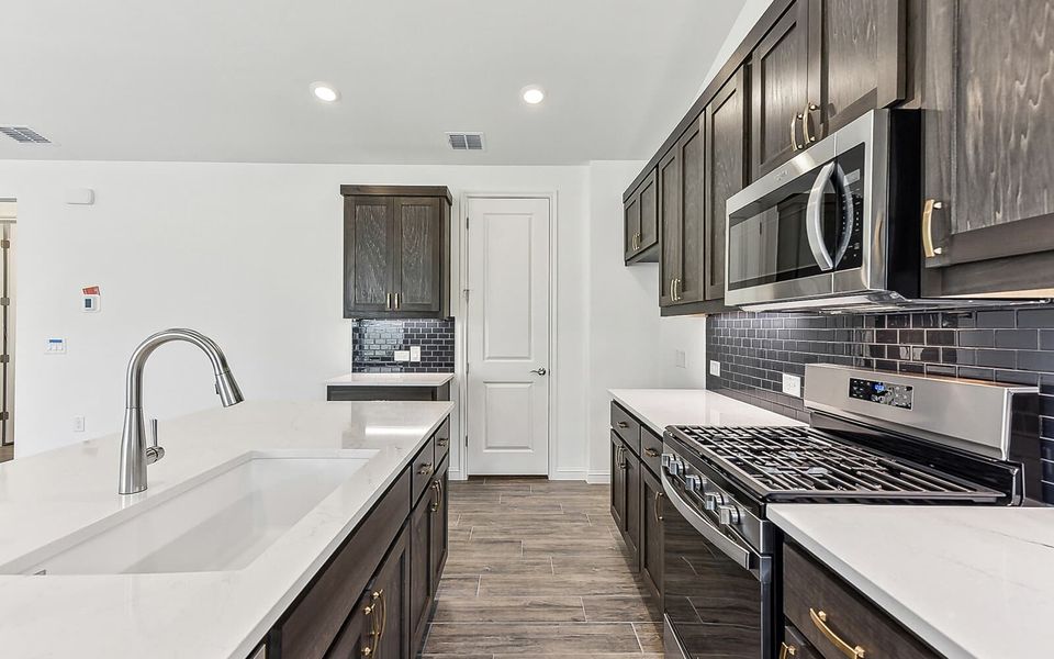 Representative furnished interior of a home built from the Newberry by Brookfield Residential in Traditional at Kissing Tree, San Marcos (Image 6).