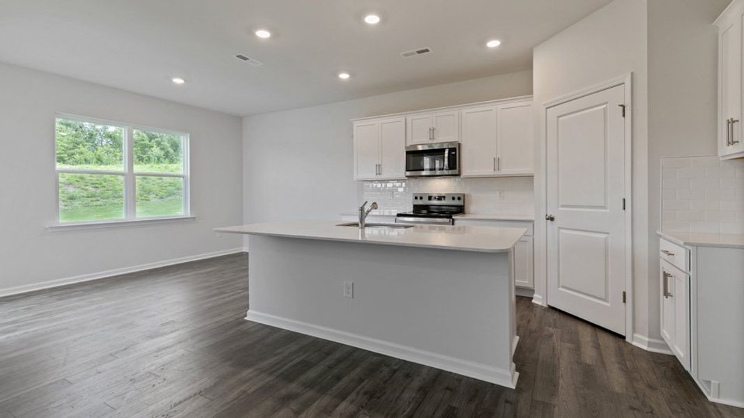 Representative furnished interior of a home built from the DARWIN by D.R. Horton in Honeycutt Oaks, Angier (Image 2). Representative furnished interior of a home built from the DARWIN by D.R. Horton in Honeycutt Oaks, Angier (Image 2).