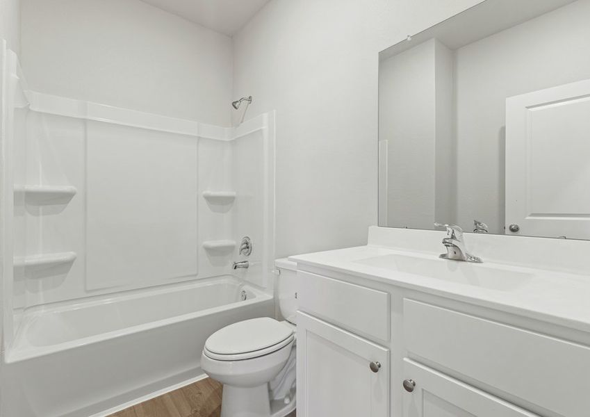 Secondary bathroom with a shower/tub combination Secondary bathroom with a shower/tub combination
