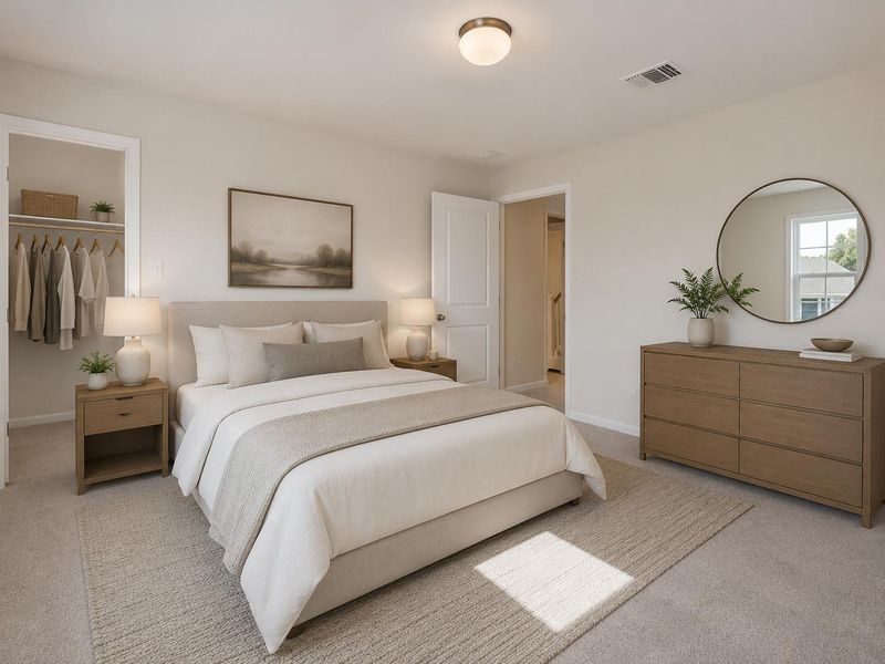 Naturally illuminated bedroom features plush carpeting and an open closet for effortless organization. Naturally illuminated bedroom features plush carpeting and an open closet for effortless organization.