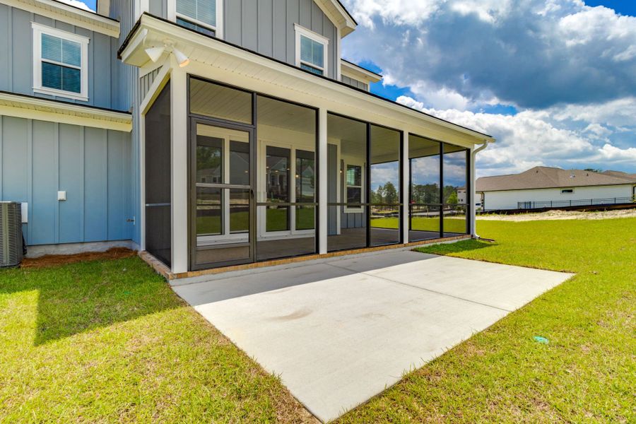 Exterior details and patio area of a home in Pecan Orchard, Elgin (Image 3).