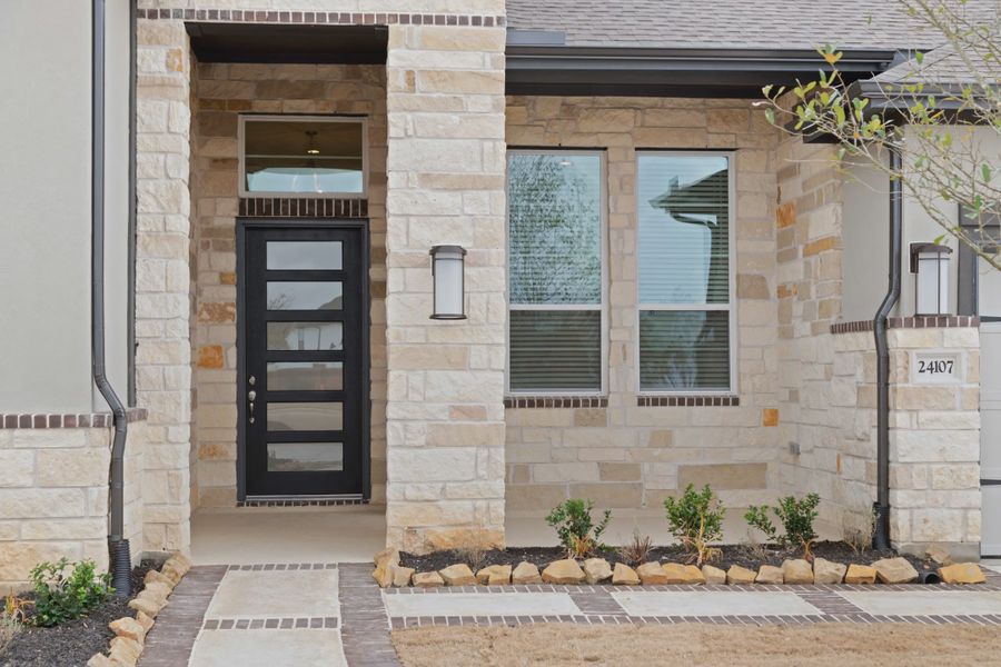 Representative exterior details of a home built from the Malibu by Chesmar Homes in Meridiana 50's and 60's, Manvel (Image 3).