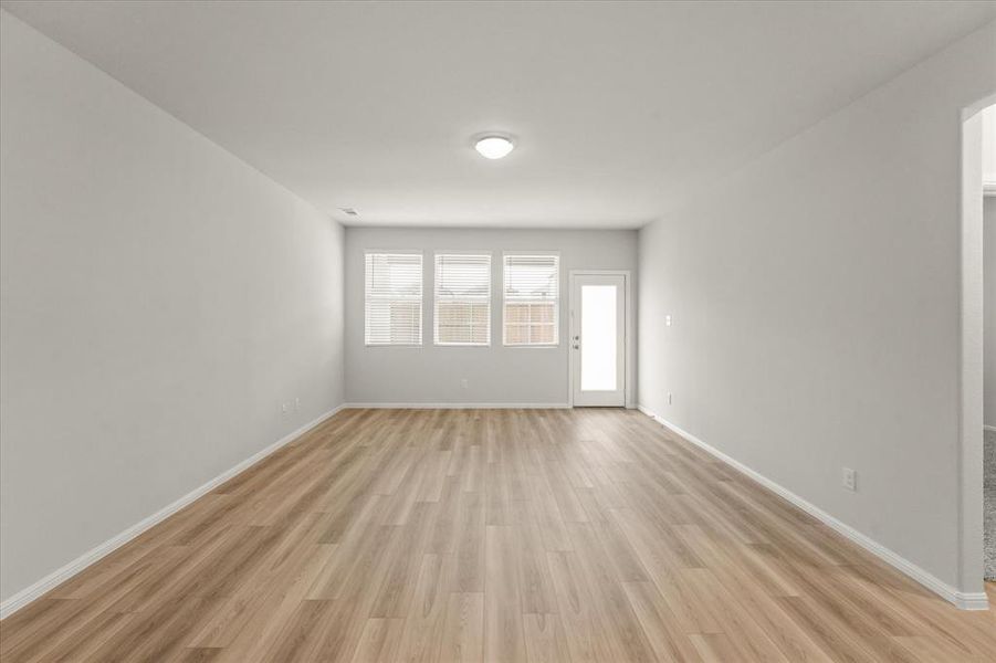 Spare room featuring light hardwood / wood-style flooring