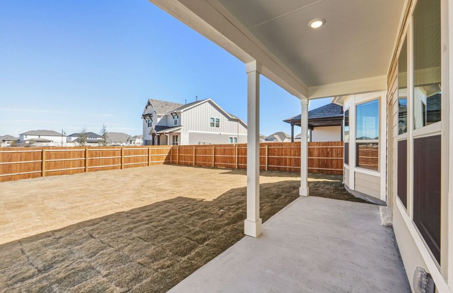 Exterior details and patio area of a home in Santa Rita Ranch, Liberty Hill (Image 31).