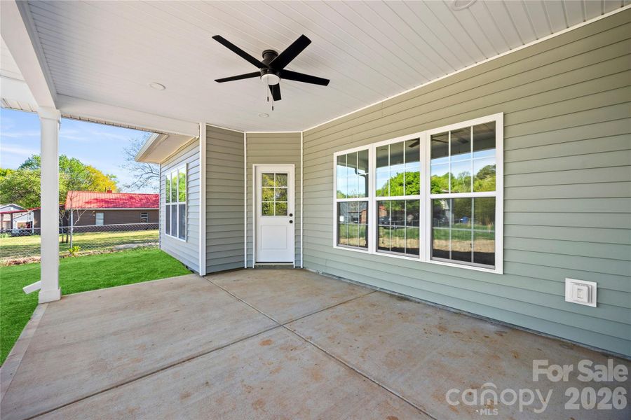 Exterior details and patio area of a home in , Troutman (Image 22).