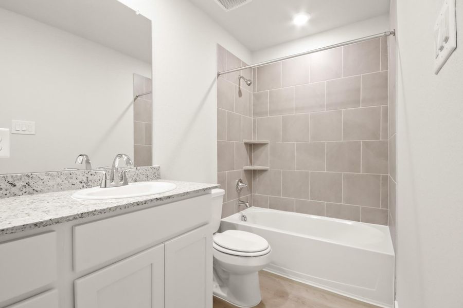 Furnished interior view inside a new home in Crockett Meadows, Conroe (Image 9).