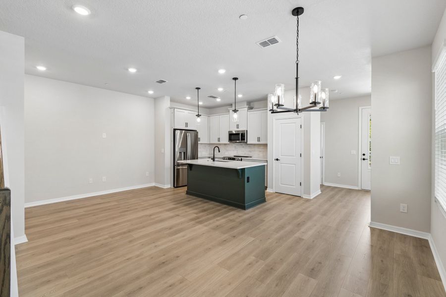 Furnished interior view inside a new home in Baldwin Crossing 22', Orlando (Image 5).
