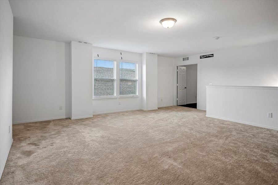 Spacious, unfurnished interior of a new home in Whitewing Trails, Princeton (Image 25).