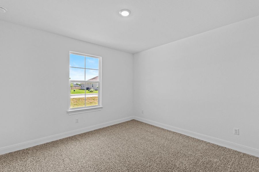 Spacious, unfurnished interior of a new home in Railhead, Cedar Creek (Image 13).