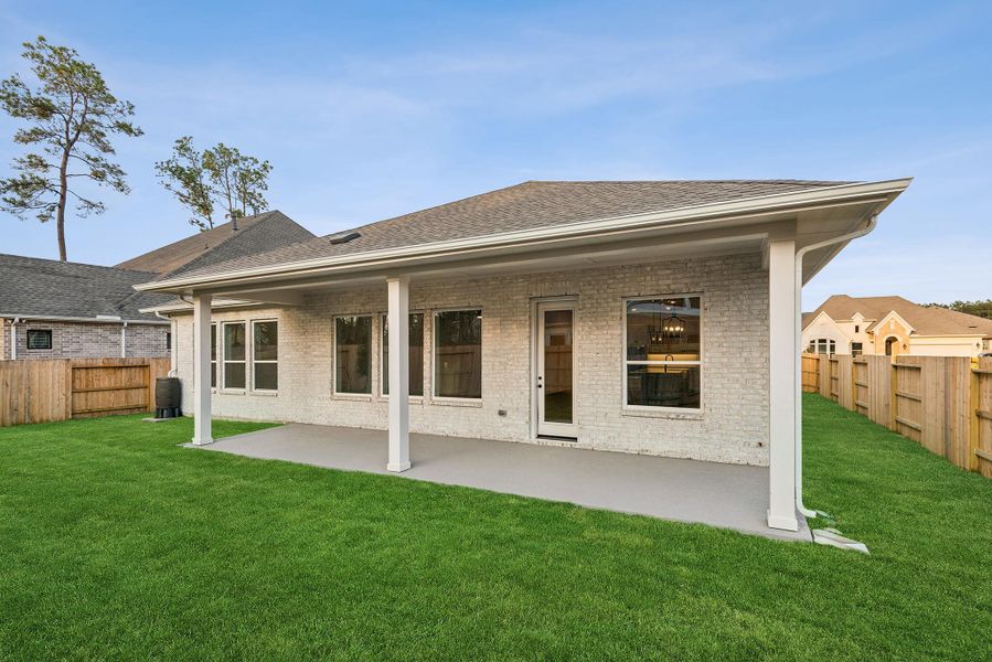 Exterior details and patio area of a home in ARTAVIA 65' Homesites, Conroe (Image 26). Exterior details and patio area of a home in ARTAVIA 65' Homesites, Conroe (Image 26).
