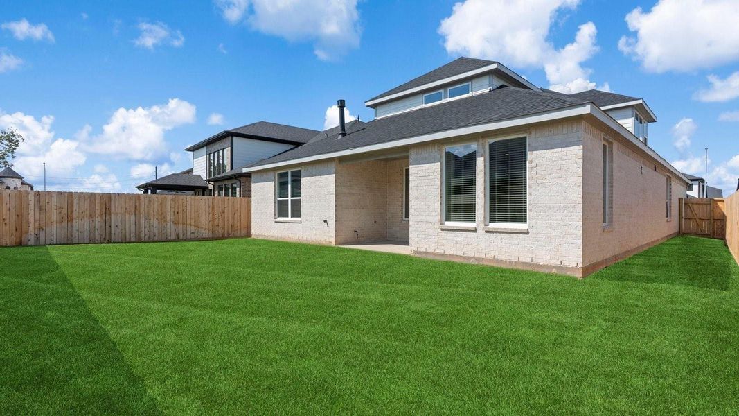 Exterior details and patio area of a home in Harvest Green, Richmond (Image 2).
