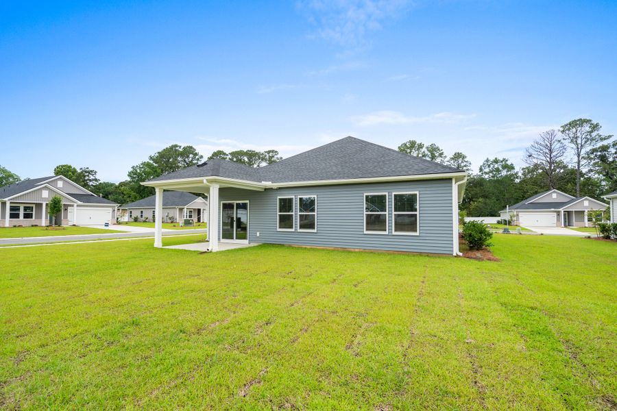 Exterior details and patio area of a home in Palmetto Place, Longs (Image 3). Exterior details and patio area of a home in Palmetto Place, Longs (Image 3).