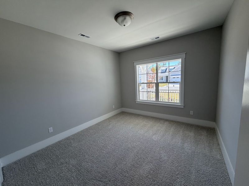 Spacious, unfurnished interior of a new home in Riverside Cove, Wilmington (Image 15).