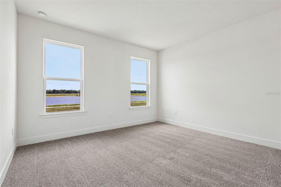 Spacious, unfurnished interior of a new home in Lakeside at Satilla, St. Cloud (Image 28).