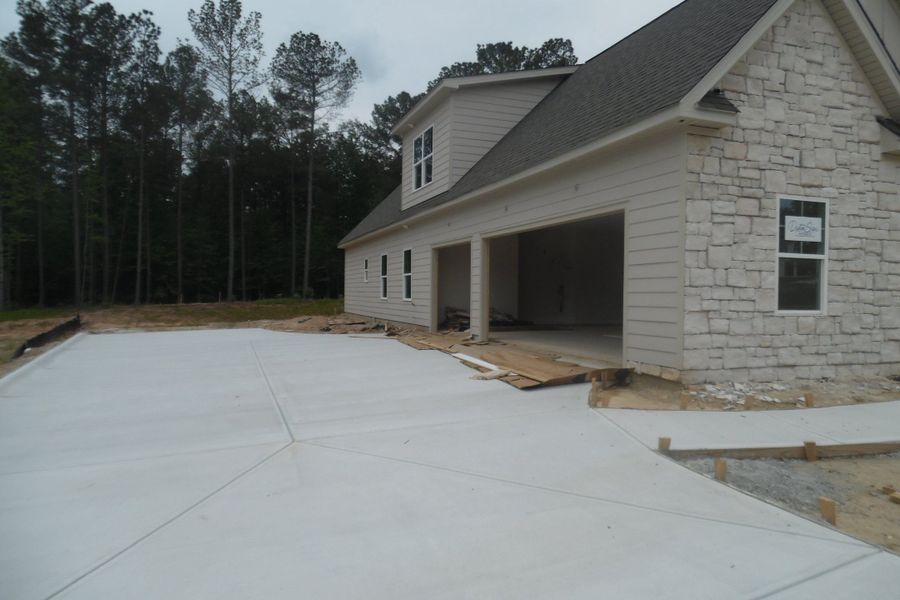 Exterior details and patio area of a home in Durham Estates, Sharpsburg (Image 2).