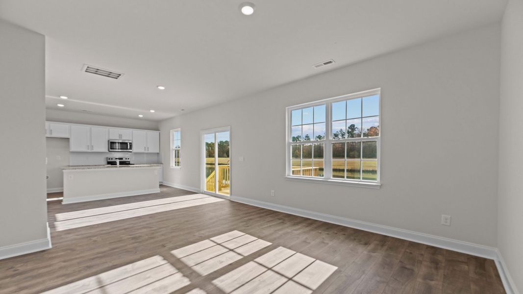 Representative unfurnished interior of a home built from the Belhaven by D.R. Horton in Tyler - Home on the Lake, New Bern (Image 9). Representative unfurnished interior of a home built from the Belhaven by D.R. Horton in Tyler - Home on the Lake, New Bern (Image 9).