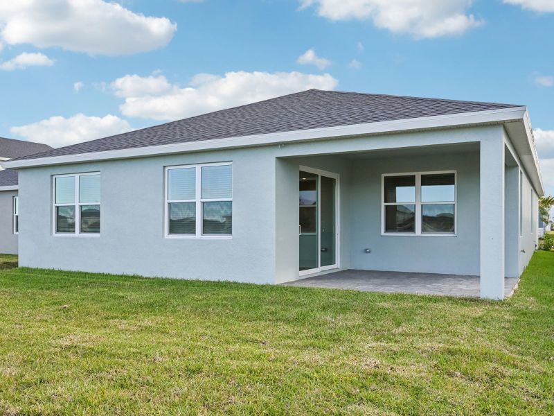 Exterior details and patio area of a home in Brystol at Wylder - Reserve Series, Port St. Lucie (Image 4).