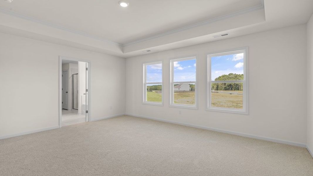 Representative unfurnished interior of a home built from the EDISTO by D.R. Horton in Eagle Creek, Fuquay Varina (Image 10).