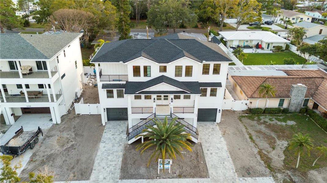 Front exterior of a new home in , St. Petersburg, FL, highlighting curb appeal (Image 2). Front exterior of a new home in , St. Petersburg, FL, highlighting curb appeal (Image 2).