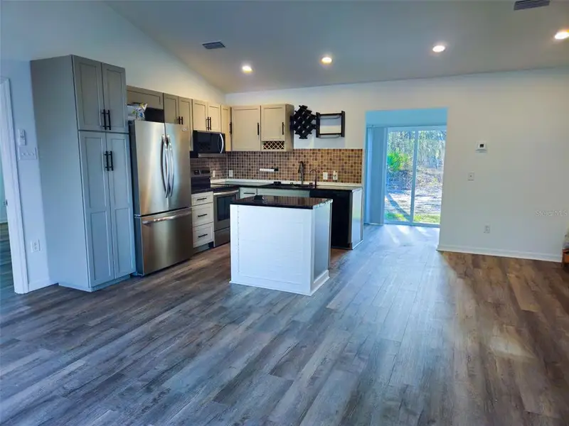 Furnished interior view inside a new home in , Dunnellon (Image 7).