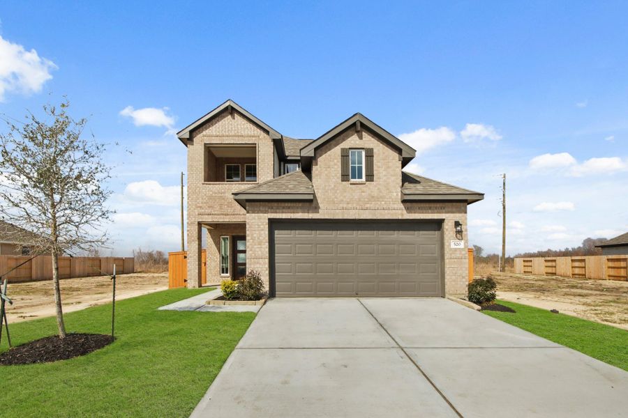 Front exterior of a new home in River Ranch Trails, Angleton, TX, highlighting curb appeal (Image 15). Front exterior of a new home in River Ranch Trails, Angleton, TX, highlighting curb appeal (Image 15).