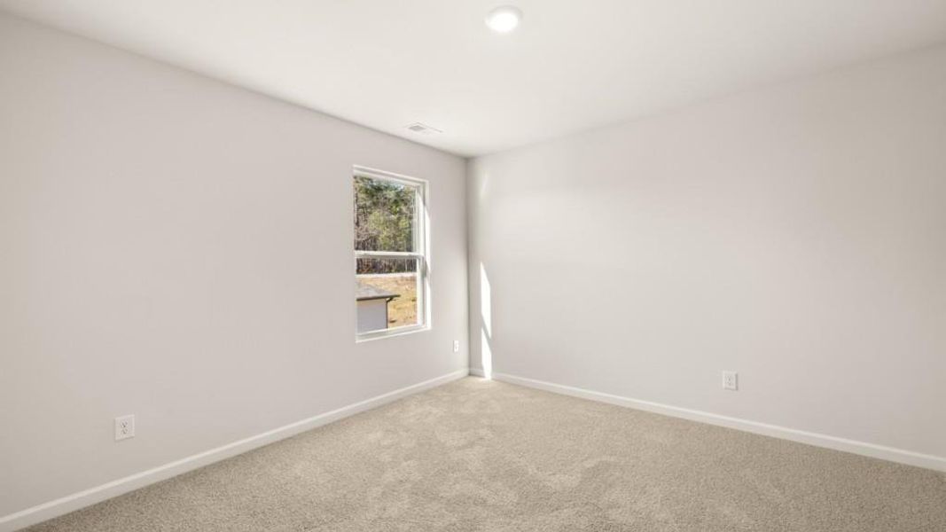 Spacious, unfurnished interior of a new home in Northwoods at Mirror Lake, Villa Rica (Image 21).