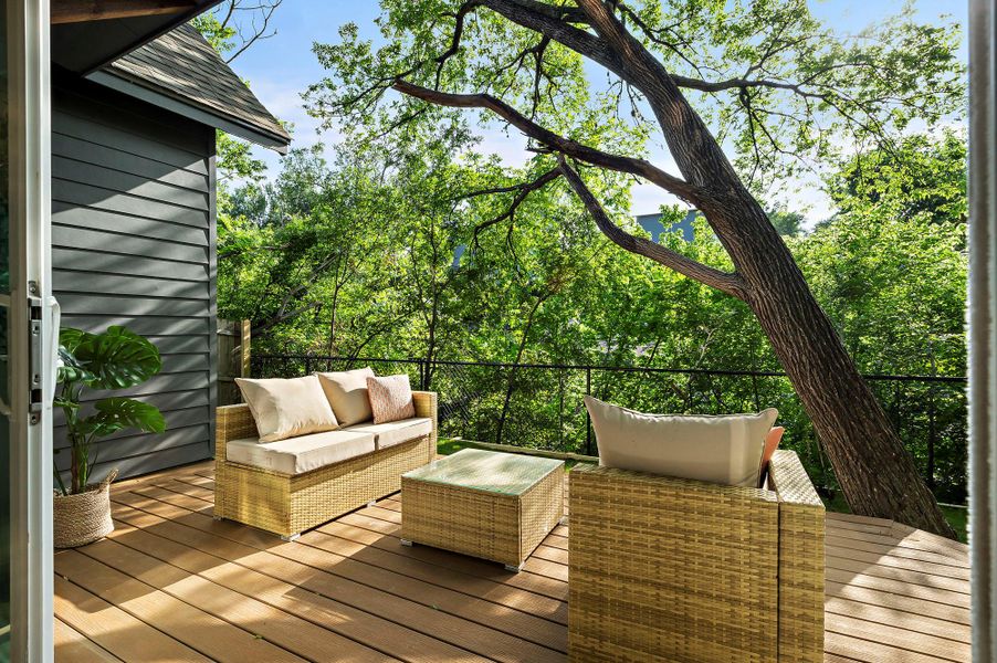 Wooden terrace featuring an outdoor hangout area