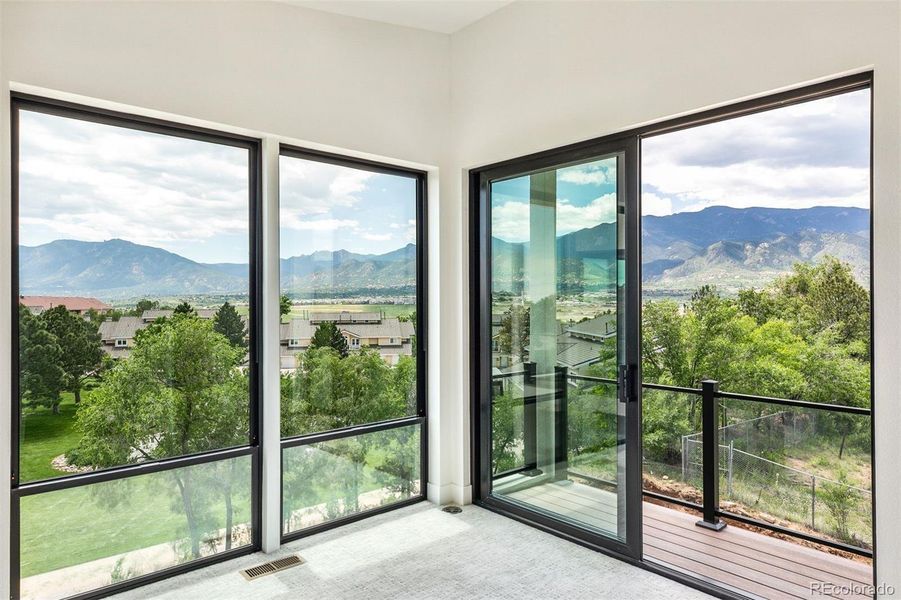 Exterior details and patio area of a home in , Colorado Springs (Image 25).
