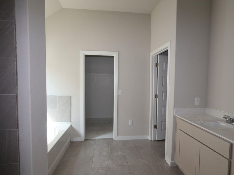 In-progress construction of a new home in Cascades at Onion Creek, Austin, TX (Image 10).