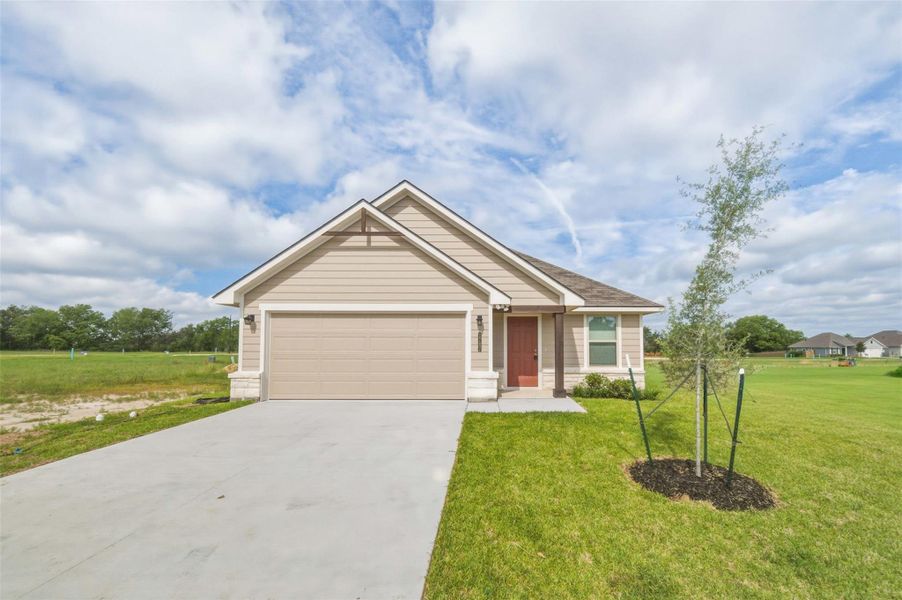 Front exterior of a new home in , Bryan, TX, highlighting curb appeal (Image 1). Front exterior of a new home in , Bryan, TX, highlighting curb appeal (Image 1).