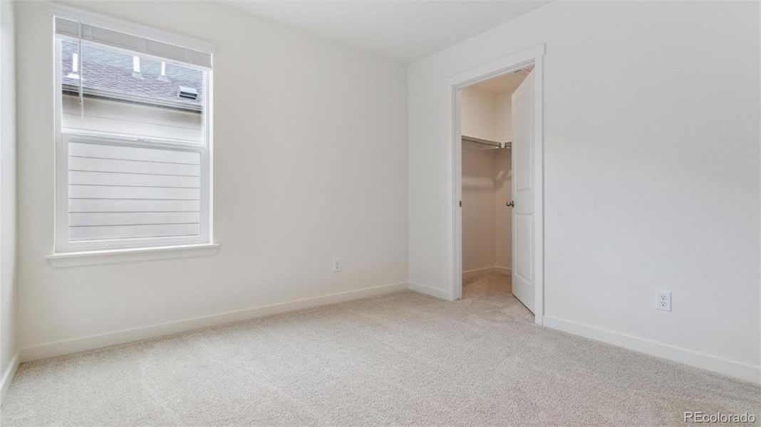 Spacious, unfurnished interior of a new home in Silver Peaks, Lochbuie (Image 18).