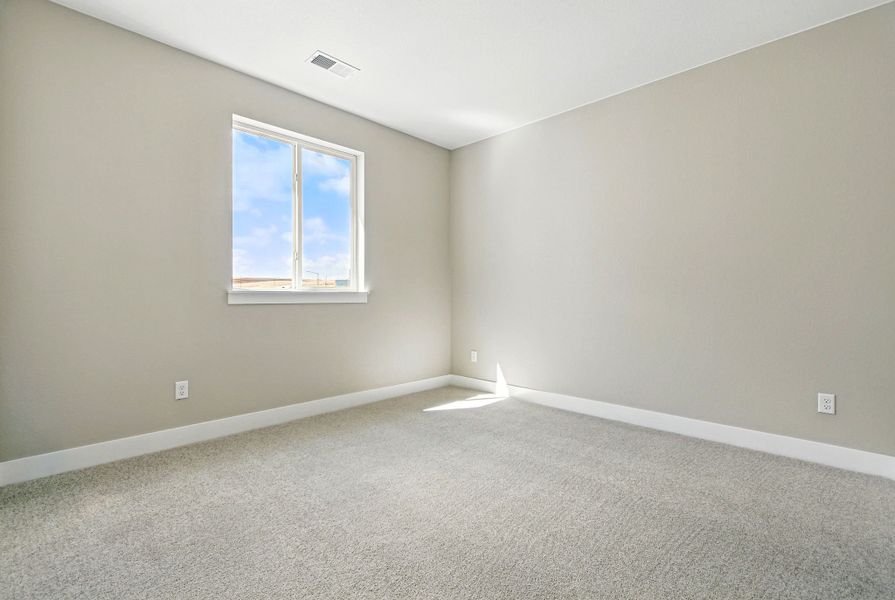 Spacious, unfurnished interior of a new home in Trailstone, Arvada (Image 35).