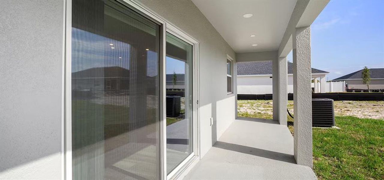 Exterior details and patio area of a home in , Winter Haven (Image 2). Exterior details and patio area of a home in , Winter Haven (Image 2).
