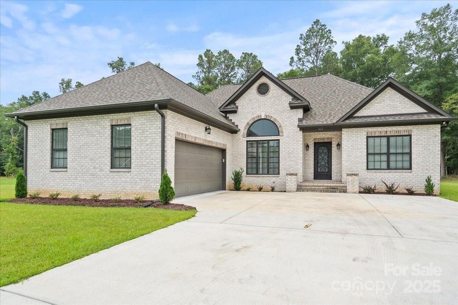 Front exterior of a new home in , Cheraw, SC, highlighting curb appeal (Image 21).