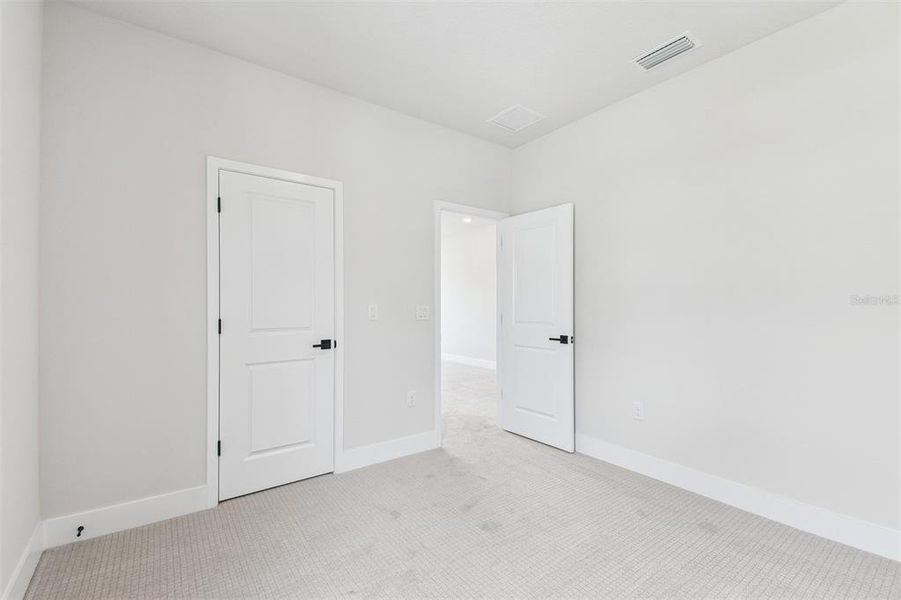 Spacious, unfurnished interior of a new home in Emerald Landing at Waterside at Lakewood Ranch – Cottage Series, Sarasota (Image 19).