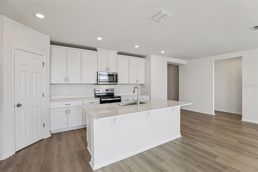Furnished interior view inside a new home in Lake Deer Estates - Signature Series, Poinciana (Image 5).