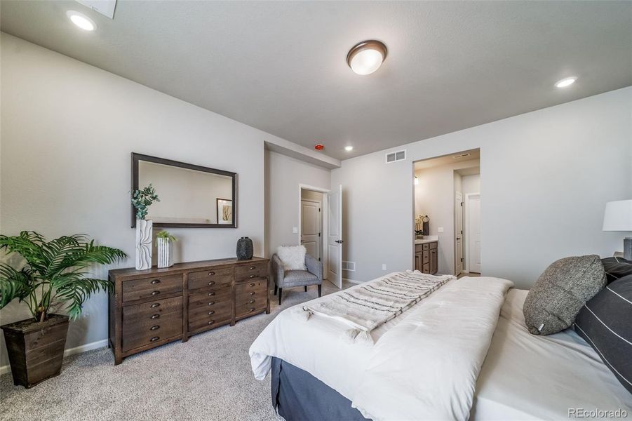 Furnished interior view inside a new home in The Reserve, Aurora (Image 5).